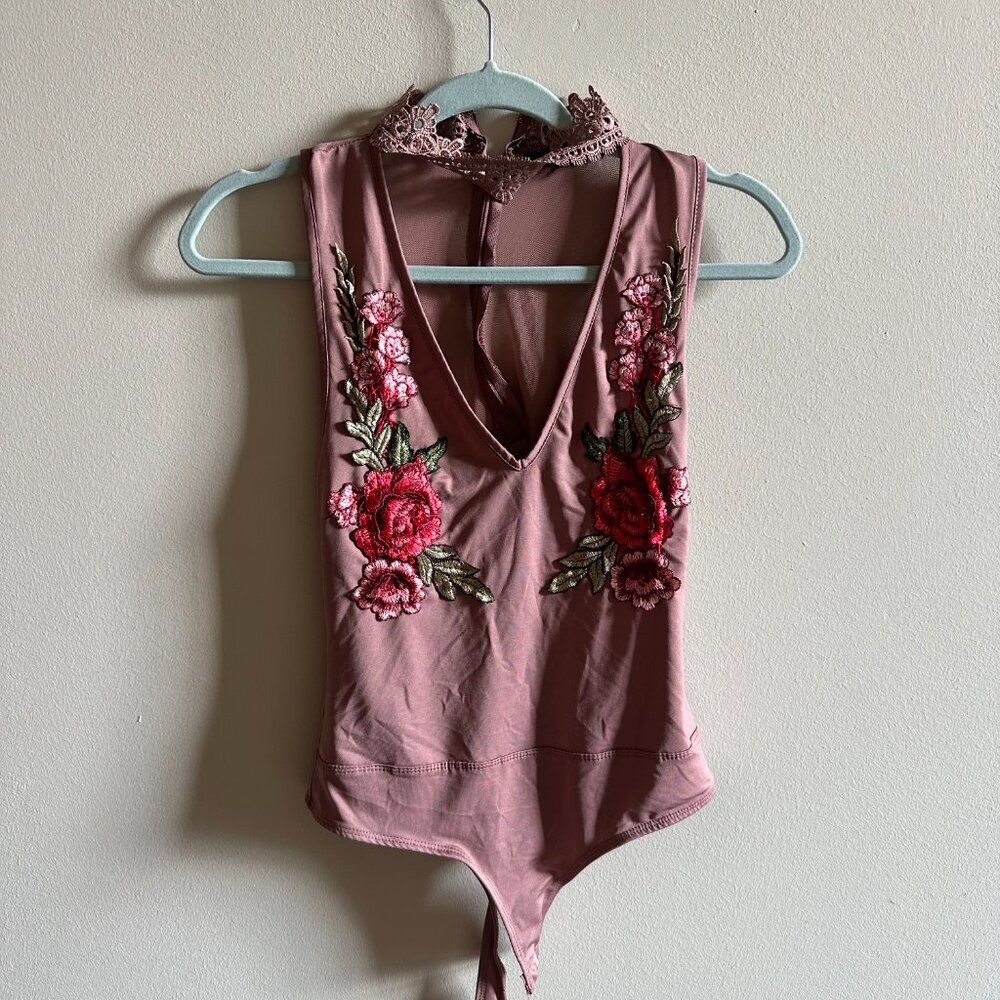 Revamped pink body suit with neck cuff and beautiful lace and flower details